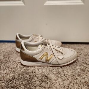 New Balance Women's White and Gold Sneakers
